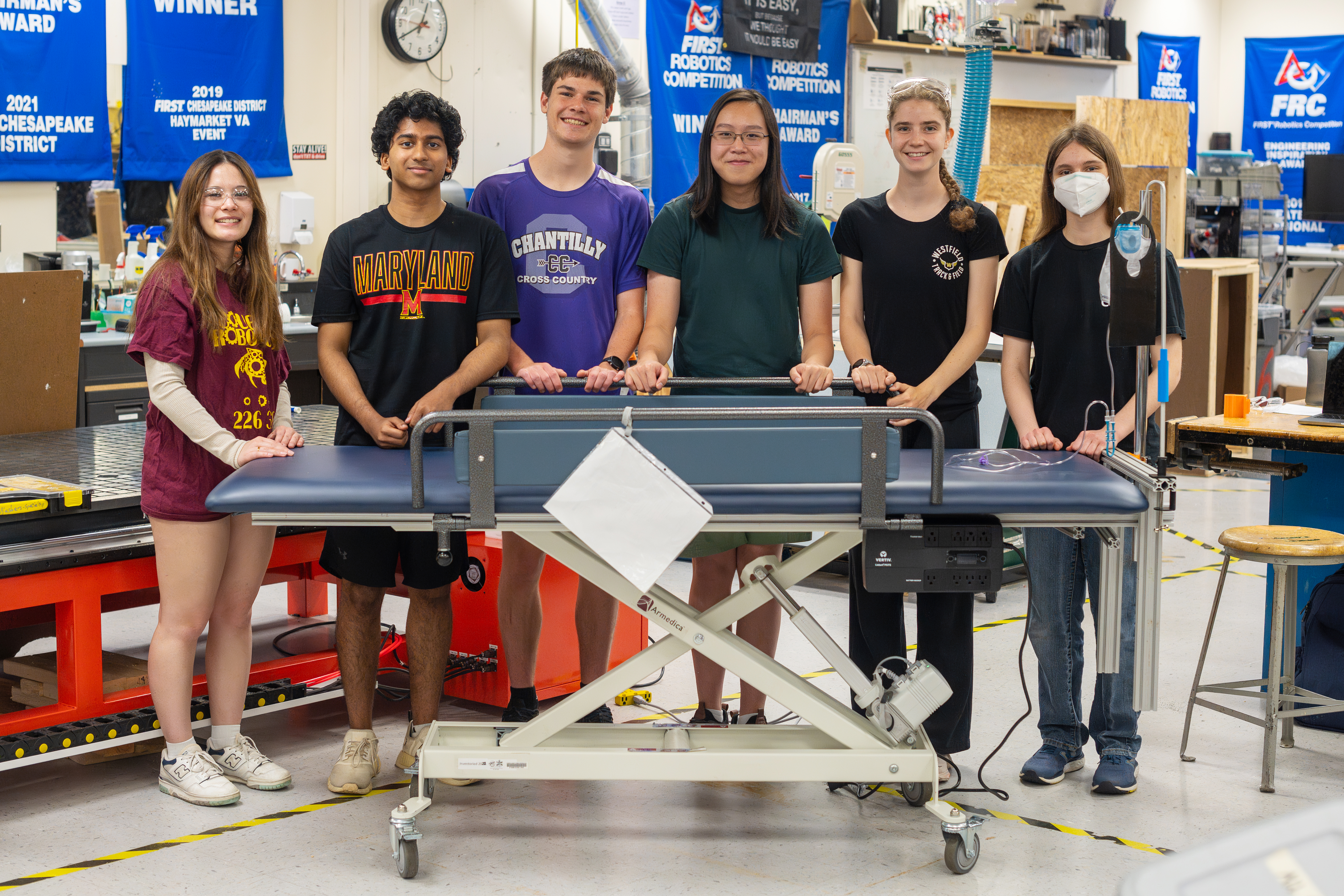 The Engineering team stands behind the near-complete bed. From left to right: Francesca Mangano, Sai Prabhu, Sebastian Nowicki, Peter Nguyen, Johanna Stuard, Tara Magill.