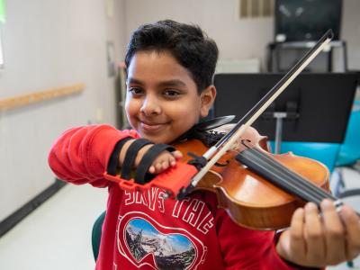 student playing viola