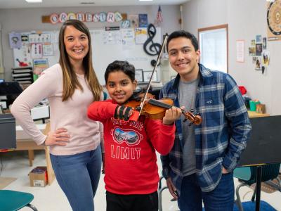 student playing viola