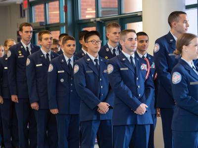AFJROTC students greeting guests